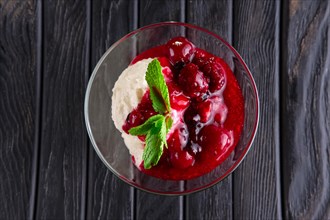 Ice cream with cherry and raspberry jam