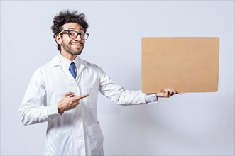 Scientist showing and pointing at a blank clipboard