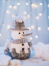 Small toy snowman white table. Resolution and high quality beautiful photo