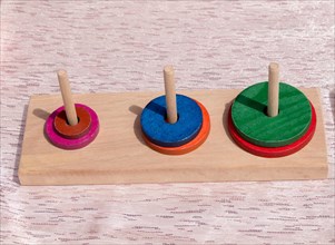 Colorful wooden puzzle element the view