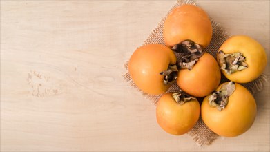 Top view tasty persimmons with copy space. Resolution and high quality beautiful photo