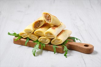 Thin crepe stuffed with chicken offal