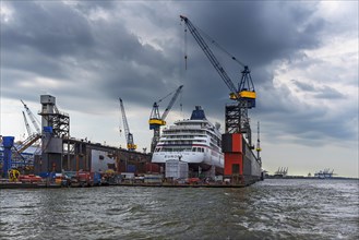 Passenger ship in Hamburg harbour in dry dock for repair