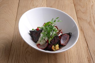 Autumn hot salad with deep fried beetroot