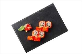 Portion of tobiko maki with caviar isolated on white background