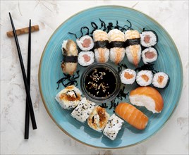 Flat lay delicious sushi with copy space