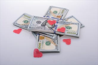 Red hearts and banknote bundle of US dollar