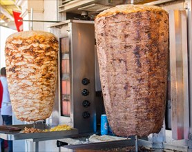 Traditional Turkish food Doner Kebab. Turnspit skewing kebap kebab shawarma