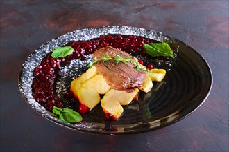 Duck breast with apple and currant sauce