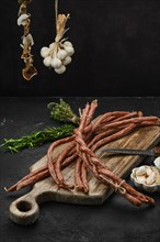 Long thin homemade beef sausages with garlic