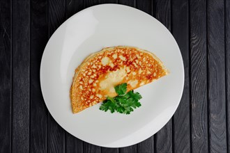 Top view of plate with thin omelet
