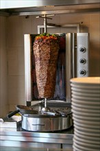 Turkish dish Doener Kebab as a turning roast