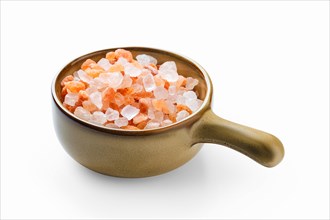 Pink Himalayan salt in a ceramic bowl isolated on white background
