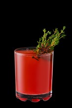 Hot cranberry winter drink with thyme