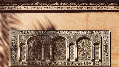 Carvings with arches and ornaments on facade