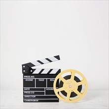 Clapboard with film reel