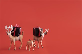 Reindeer toys with gift boxes