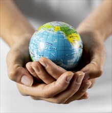 Person holding earth globe. Resolution and high quality beautiful photo