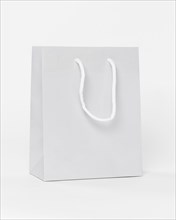 White paper shopping bag with handles. Resolution and high quality beautiful photo