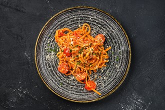 Overhead view of pasta with tomato