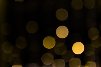 Christmas abstract defocused glowing light dark backdrop