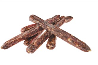 Dried jerked deer and pork sausage isolated on white background