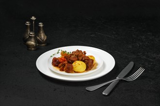 Lamb stew with potato on a plate
