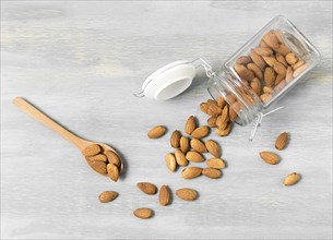 Top view almonds jar with spoons. Resolution and high quality beautiful photo