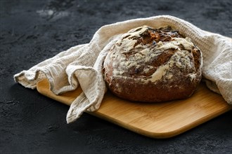 Artisan freshly baked broun bread with raisins