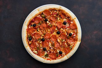 Top view of pizza sicilian with salami