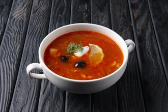 Traditional rustic saltwort soup solyanka