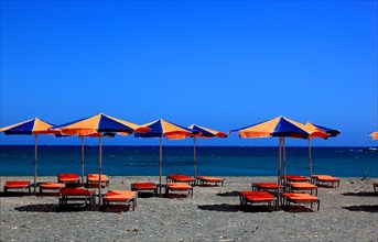 Beach chairs and umbrellas on the beach