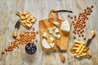 Top view of cheese plate and other snack for wine