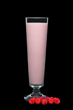 Tall glass of raspberry milk isolated on black background