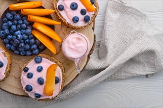 Closeup view of sweet buns with yogurt