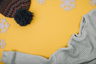 Sweater bobble hat near snowflakes. Resolution and high quality beautiful photo