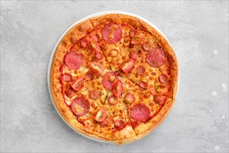 Overhead view of pizza pepperoni with two kind of sausages