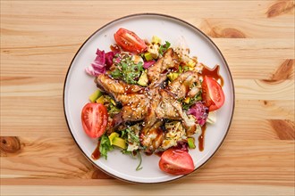 Salad with smoked eel with avocado and tomato