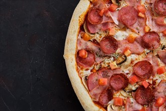 Close up view of pizza with ham