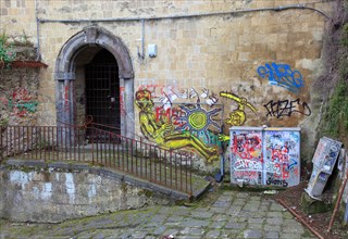 Grafitti and graffiti in the old town of Naples