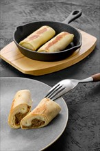 Thin pancakes stuffed with beef meat