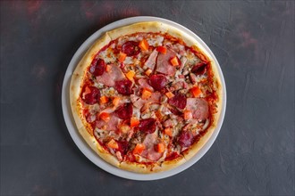 Pizza with ham and mushrooms