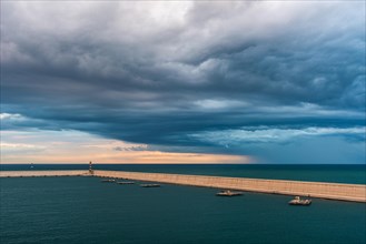 Dramatic sky and clouds during a storm over Port of Valencia
