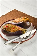 Semifinished aubergine with meat and spice filling