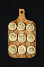 Top view of champignons stuffed with parsley