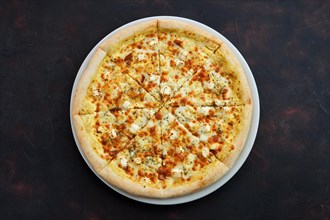 Top view of pizza with five kind of cheese