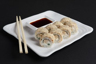 Chicken teriyaki roll with soy sauce and hashi