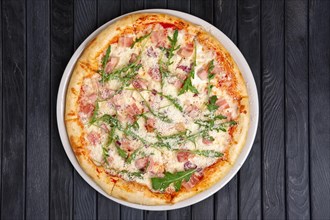 Top view of pizza with ham