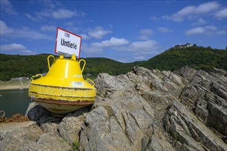 Dry buoy at low water in Lake Edersee