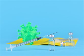 Vaccination against Corona concept with vials and syringes